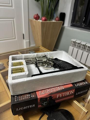 fire fire ucun adlar: PYTHON 357 Magnum qazla işləyən alışqan 2 eded var. Heresi 49 AzN dir — 2