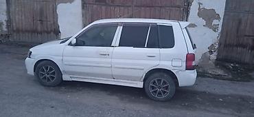 Mazda Demio: 2002 г., 1.3 л, Автомат, Бензин, Хэтчбэк
