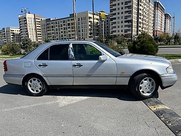 mersedes peci: Mercedes-Benz C 200: 2 l | 1995 il Sedan — 2