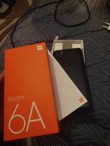 Xiaomi: Xiaomi Redmi 6A, 32 GB, rəng - Qara, 
 Sensor, İki sim kartlı