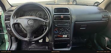 Opel: Opel Astra karvan (universal) – yaşıl rəng - Kuzov: universal, dam — 13