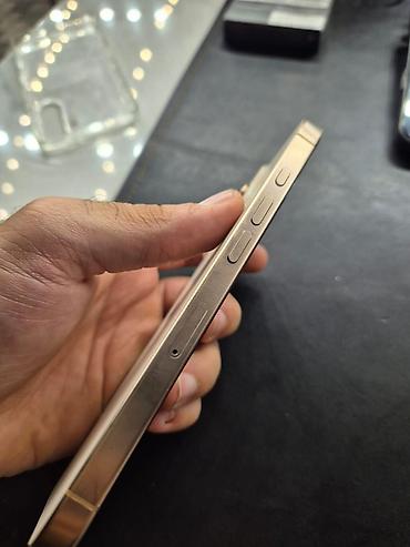 iphone 16 e: IPhone 16 Pro, Qızılı, Barmaq izi, Face ID — 3