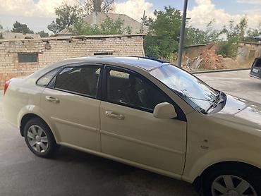 токмок бетон: Chevrolet : 2014 г., 1.6 л, Кол менен иштөөчү, Бензин, Седан — 6