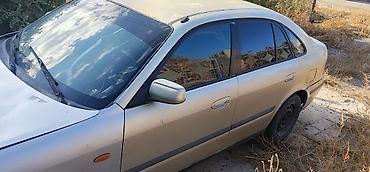 китайский номер: Mazda 626: 1999 г., Бензин, Седан — 4
