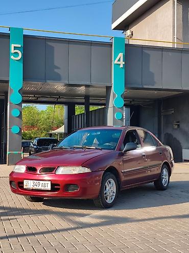 нексия сиденья: Mitsubishi Carisma: 1998 г., Седан — 1