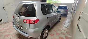 210 cdi: Mazda Demio: 2004 г., 1.3 л, Автомат, Бензин, Хэтчбэк — 6