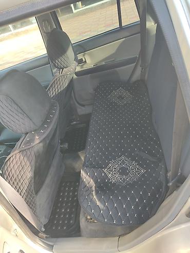 митсубиши спейс стар: Mazda Demio: 2004 г., Автомат, Бензин — 9