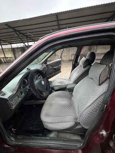 Daewoo: Daewoo Nexia: 2012 г., 1.6 л, Механика, Бензин, Седан — 13