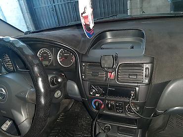 рестайл: Nissan Almera: 2004 г., 1.5 л, Механика, Бензин, Хэтчбэк — 9