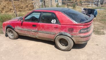 обмен на частный дом: Mazda 323: 1992 г., 1.6 л, Механика, Бензин, Хэтчбэк