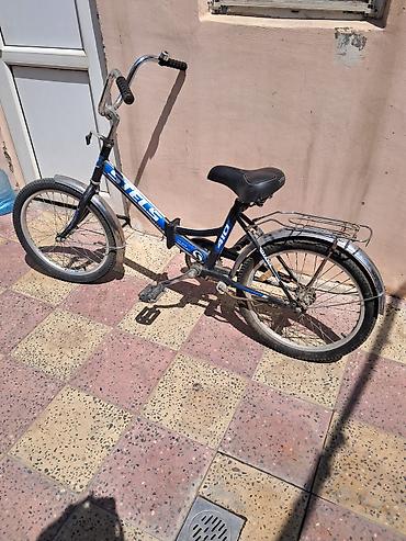 Velosipedlər: Uşaq velosipedi – STELS 410 Xüsusiyyətlər: - Ölçü: 20" təkərlər - — 2
