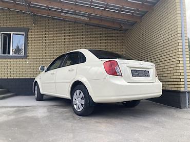 токмок бетон: Chevrolet : 2014 г., 1.6 л, Кол менен иштөөчү, Бензин, Седан — 4