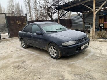 mazda 626 кронос: Mazda Protege: 1995 г., 1.8 л, Механика, Бензин, Седан