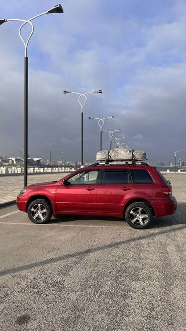 sürətlər qutusu: *Satılır: Mitsubishi Outlander *İli:* (2004) *Mühərrik:* (Mühərrik