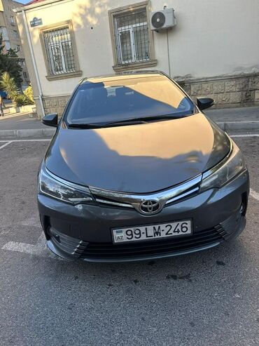 Toyota Corolla: 1.6 л | 2016 г. Седан