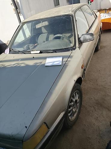 руль марк 2: Mazda 626: 1991 г., Механика, Бензин — 3