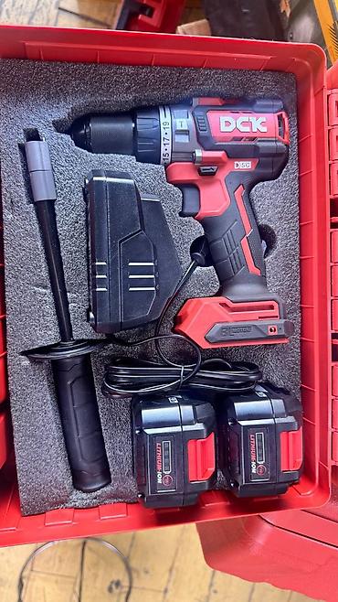 black decker: Аккумуляторная ударная дрель‑шуруповёрт DCK (модель — 1