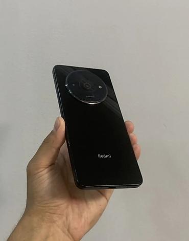internet device: Смартфон Redmi (черный) - Экран: безрамочный дисплей с каплевидным — 2