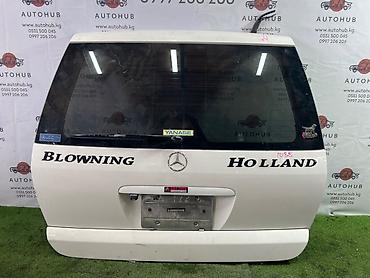 полка мерс: Задняя дверь багажника для Mercedes-Benz (с эмблемой MB), белая — 1