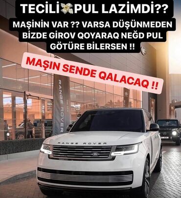 ravon satış mərkəzi: Ağ rəngli, müasir dizaynlı Range Rover SUV. Avtomobil geniş ön paneli
