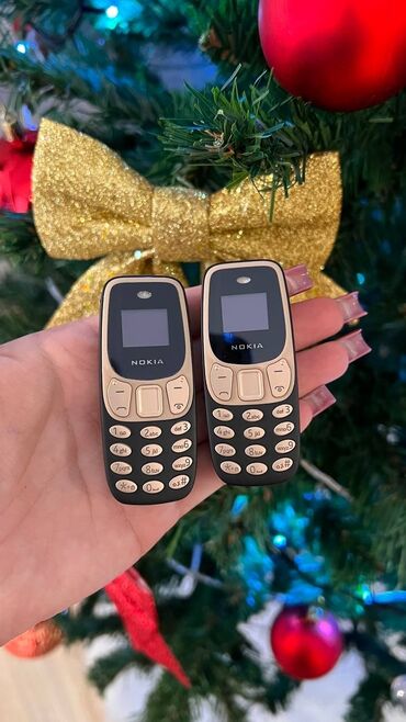 мини телефон нокиа: Nokia 1, < 2 ГБ, цвет - Черный, Гарантия, Кнопочный, Две SIM карты
