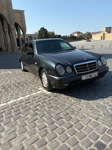 Çəngəllər: Mercedes-Benz E 200: 2 l | 1998 il Sedan