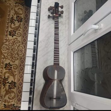 Gitaralar: Tar satılır tecili hec bir problemi yoxdur qara tardi perofisanal