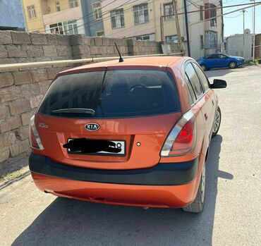 afdamabilər: Kia Rio: 1.4 l | 2006 il Hetçbek