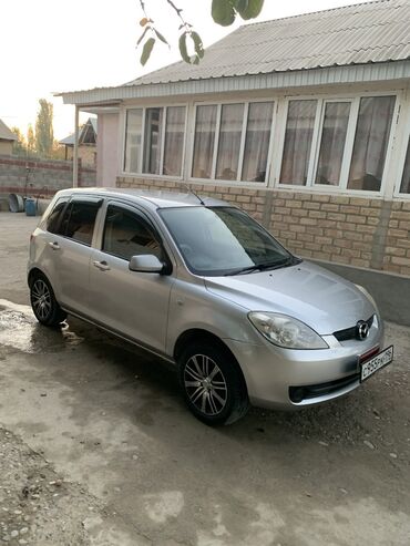 Mazda: Mazda Demio: 2005 г., 1.4 л, Автомат, Бензин, Седан