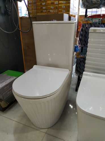 Qapılar və aksessuarlar: Müasir dizaynlı, birgə gövdəli (monoblok) unitaz - Material: yüksək