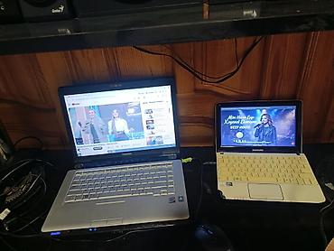 ucuz komputer: Toshiba Satellite noutbuk. Gümüşü rəngdə klassik korpuslu modeldir — 1