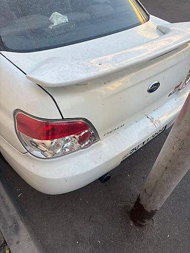 kovş: Subaru Impreza: 2 l | 2007 il 301000 km Sedan — 6