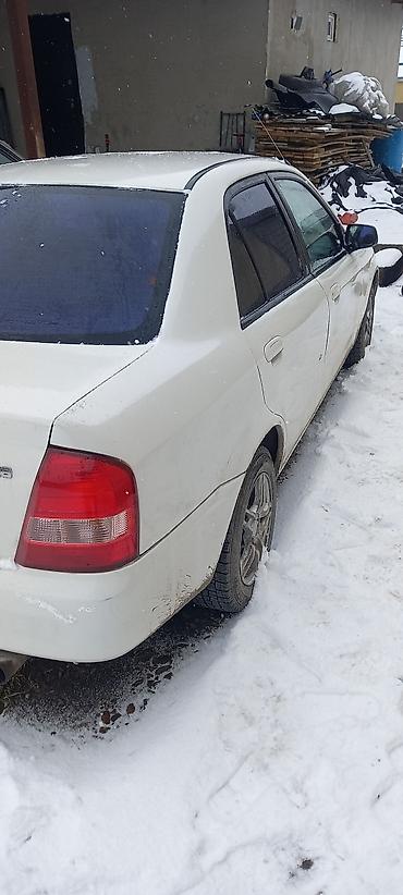 sr group: Mazda Familia: 1999 г., 1.5 л, Автомат, Бензин, Седан — 5