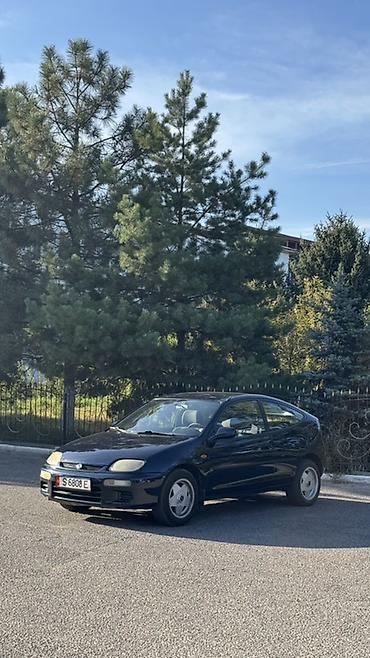 140 280: Mazda 323: 1996 г., 1.4 л, Механика, Бензин, Хэтчбэк — 2