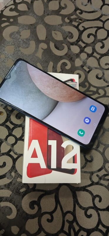 düyməli telefon: Samsung Galaxy A12, 32 GB, rəng - Göy, Barmaq izi