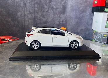 Avtomobil modelləri: Коллекционная модель Hyundai i30 5 door white 2012 Pino B&D Scale — 16