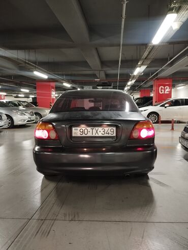 invertor nədir: Kia Shuma: 1.5 l | 2000 il Sedan