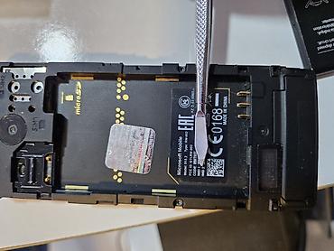 işlənmiş dinamiklər: Nokia 500, 2 GB, rəng - Ağ, İki sim kartlı — 10