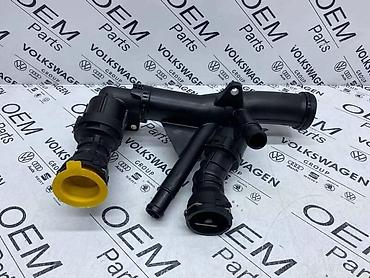 3 103: TERMOSTAT SA RACVOM ZA VOLKSWAGEN TIGUAN, TOURAN, GOLF 7 . - 04L 121 — 2