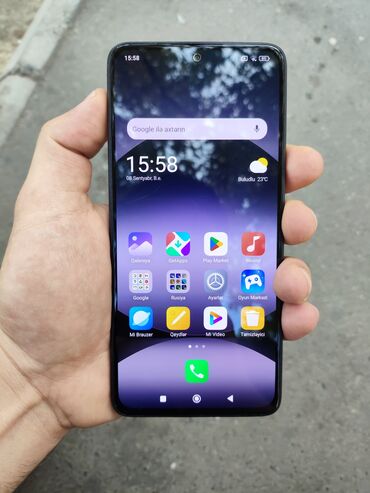 Видеоигры и приставки: Xiaomi 14, 256 ГБ, цвет - Черный, 
 Отпечаток пальца, Две SIM карты