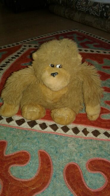 мягкая игрушка медвежонок: Детская мягкая игрушка. коричневая обезьяна. синтетический материал