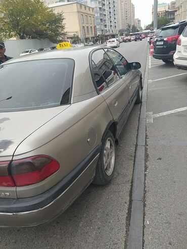 opel astra h ucun: Opel Omega: 2.5 l | 1997 il Sedan