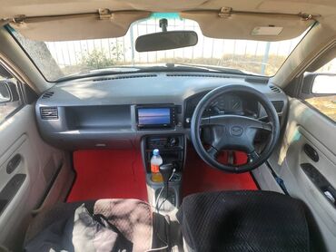 адмен машина: Mazda Demio: 1999 г., 1.3 л, Автомат, Бензин, Хэтчбэк