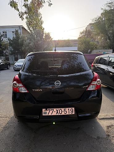 mini cooper 2009: Nissan Tiida hetçbek kuzovlu Qadin surub Cox ekonomik masindi ! — 6