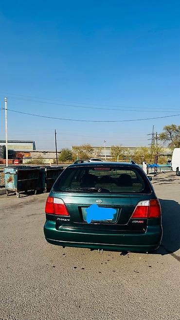 mazda 323 2003: Nissan Primera: 2001 г., 1.8 л, Механика, Бензин, Универсал — 4