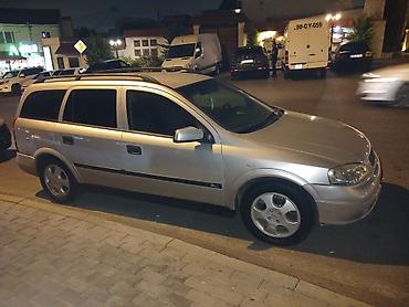 tavan ventilator: Opel Astra Caravan (estate) – gümüşü rəngdə, 5 qapı, geniş baqajlı və — 5