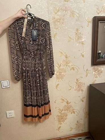 Qadın paltarı – ilan dərisi (snake print) naxışlı, midi uzunluqda - lalafo.az -da Qadın paltarı – ilan dərisi (snake print) naxışlı, midi uzunluqda -