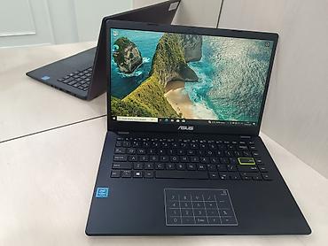 ASUS E410M Notebook — легкий и стильный 14-дюймовый ноутбук для учебы