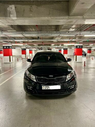Kia: Kia Optima – qara rəng, sedan kuzov. Şəhərdaxili və magistral yollarda — 4
