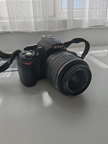 nikon şunuru: Nikon D3100 fotoaparat. Batareyası var, adapteri yoxdur — 2